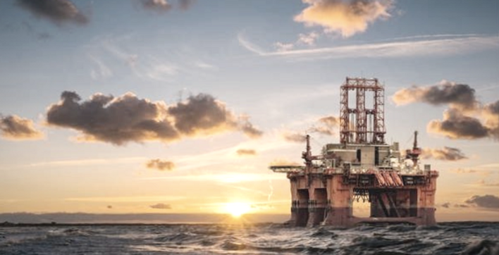 Sunrise at offshore oil rig