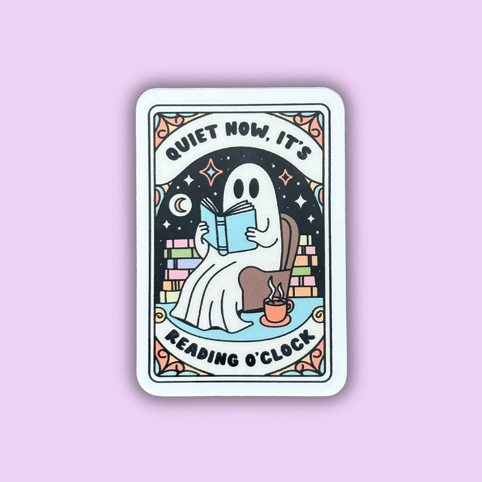 A vinyl sticker with a matte finish featuring a cartoon illustration of a ghost reading a book, with the text 'QUIET NOW, IT'