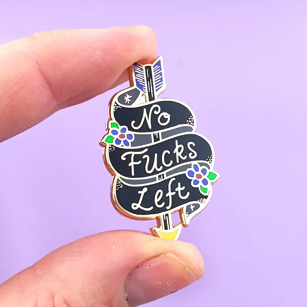 An enamel lapel pin with the text 'No Fucks Left' surrounded by a graphic of an arrow and flowers.