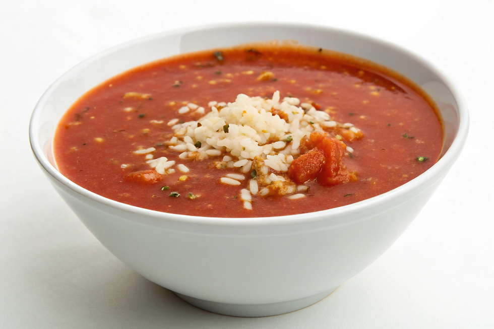 Tomato-based soup with rice or small pasta, a simple everyday Balkan favorite.