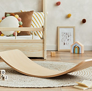 Creative composition of cozy scandinavian child's room interior with bed, plush toys, bala