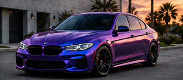 Purple color-change vehicle wrap on luxury sedan