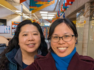 Anita Yip, right, with Principal Soo Hoo.