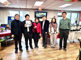 Dr. Kong, center, at an autism event in April of 2024.