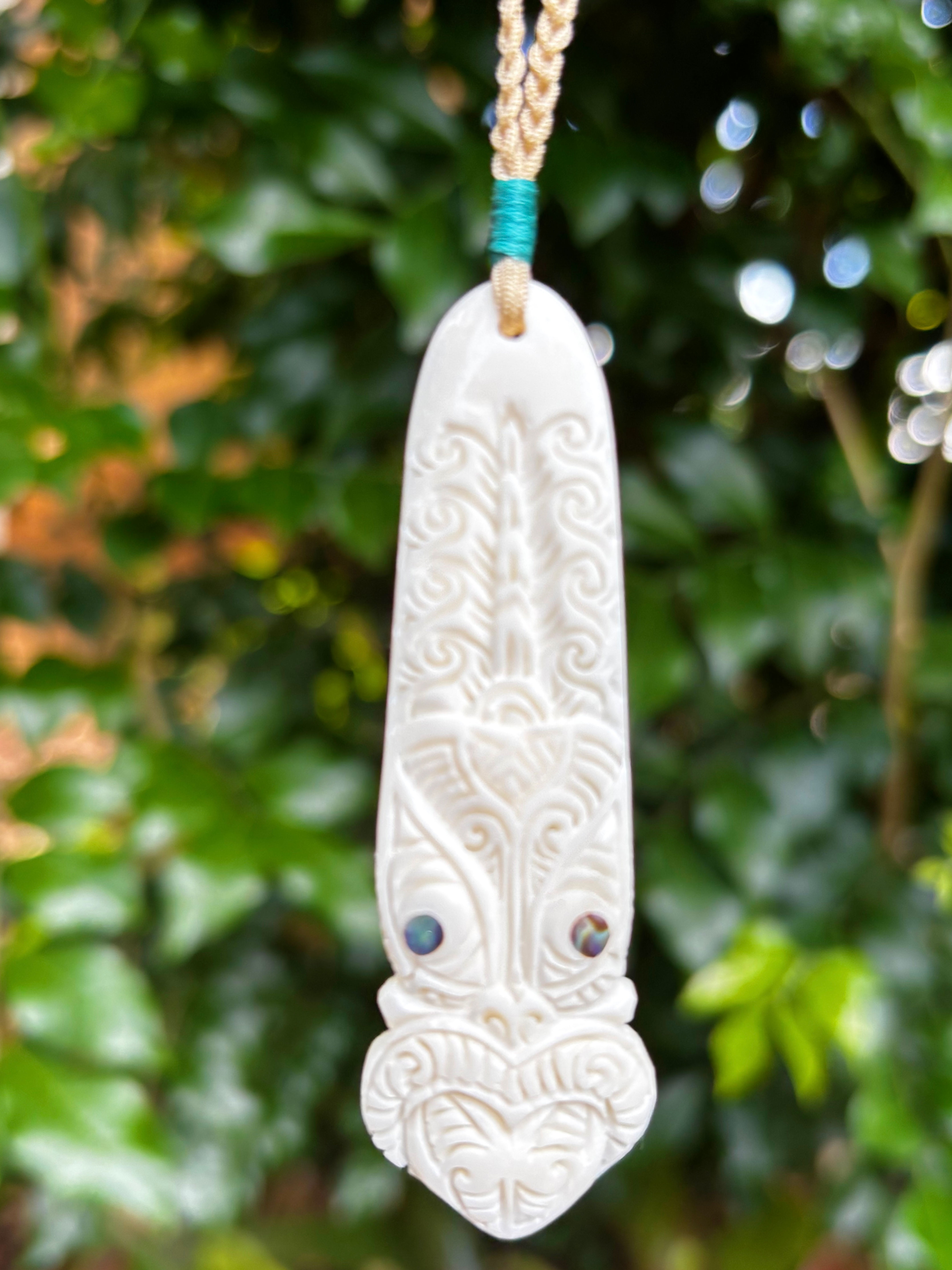 Tiki Wheku Bone Pendant – Turquoise Edition