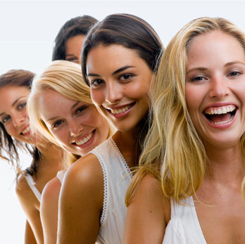 5 laughing women in a line