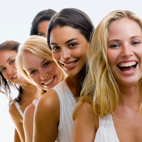 5 laughing women in a line