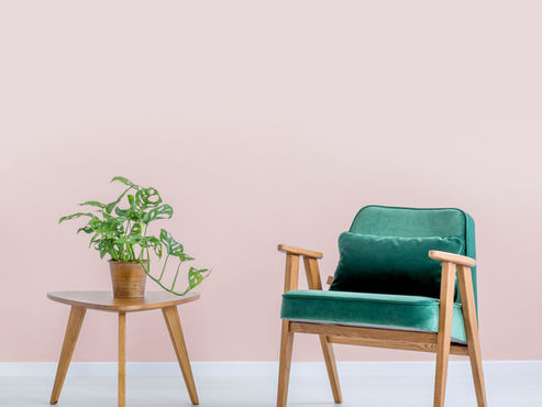 Why does the body feel stiff after prolonged sitting?