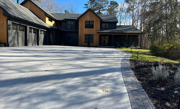 The installation of a Stamped Concrete Driveway. New Concrete Driveway installation.