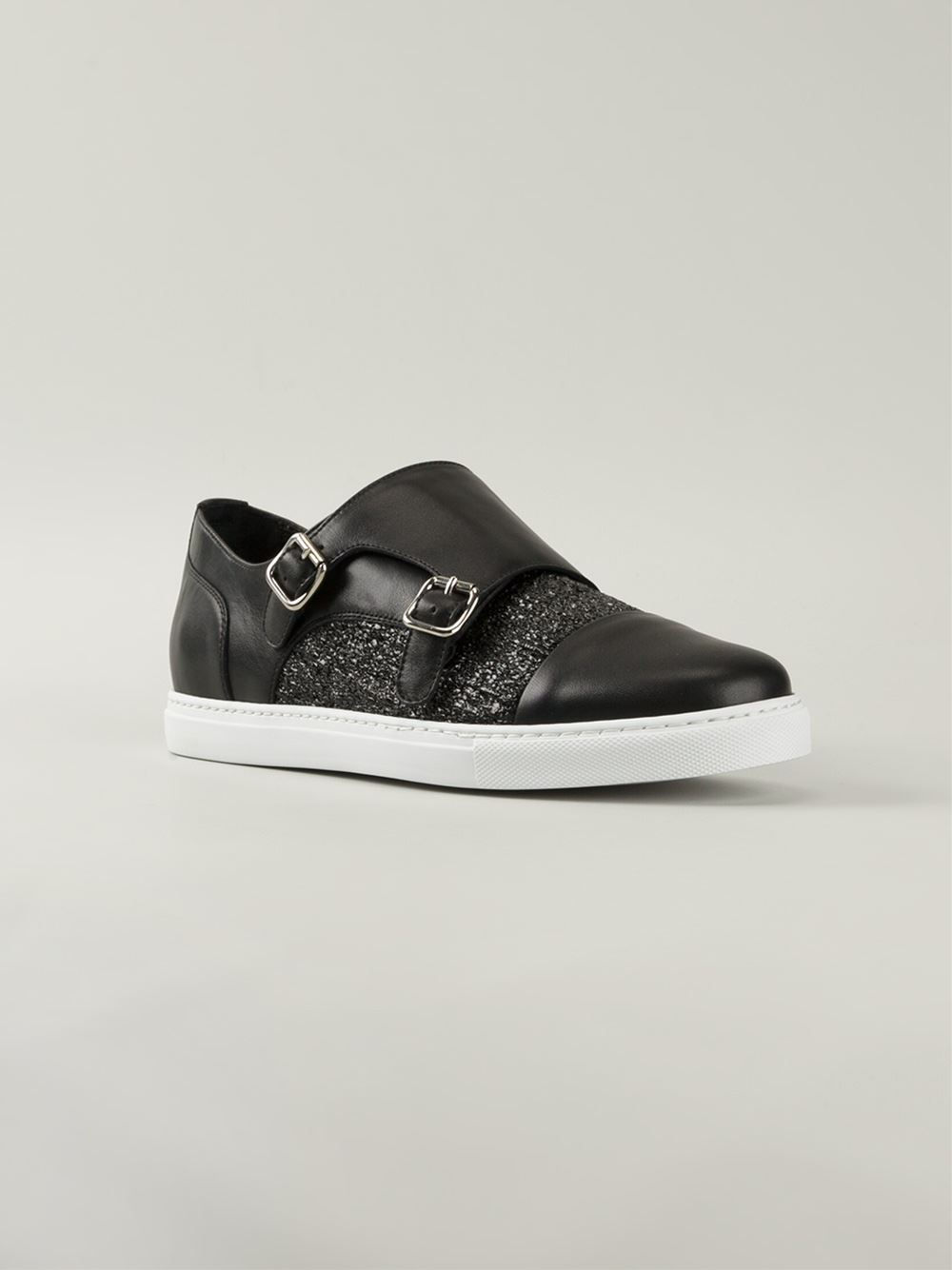 buckled plimsolls