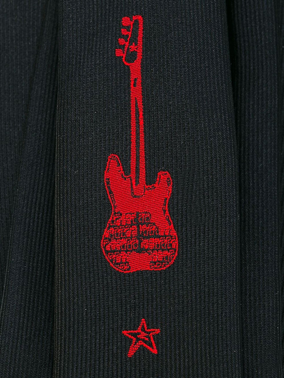 Thumbnail: woven guitar tie