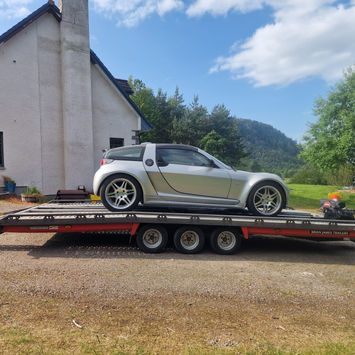 Smart Roadster on Inverness Recovery trailer — vehicle recovery Inverness to Farr.