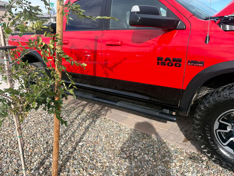 Red Ram 1500 truck parked outside, black trim, sunny day, ljs elite mobile detailing gold canyon