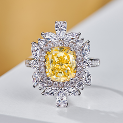 The classic splendor of this impressive yellow, created diamond ring is timeless.