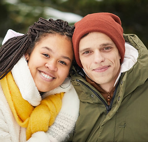 portrait-young-couple-embracing-smiling-