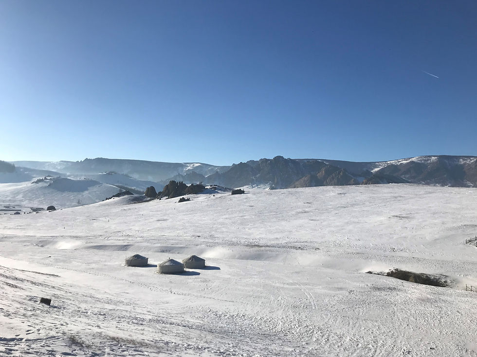 Snow covered landscape in Tov, Mongolia, with nomadic ger