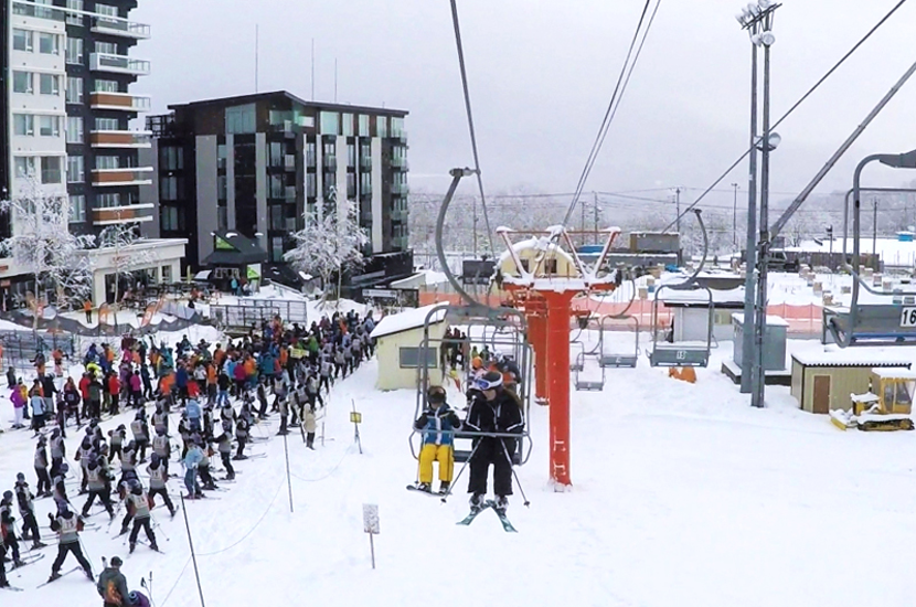 People Queuing Crowded Busy Lift Lines at Niseko Ski Resort