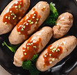 Steamed Chicken Sausage with Sauce, top down view.jpg