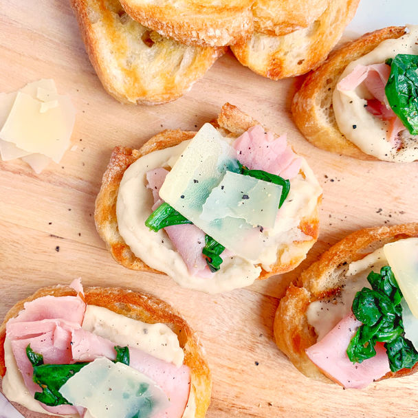 Grilled Ham and Cheese Crostini with Garlic White Bean Puree