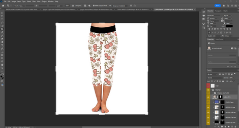 Cherry blossom pattern applied to capri leggings mockup in Photoshop on flat foot model.
