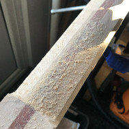 Carving the neck - Inserting fret markersLocating the fret markers -  the image shows a partially completed Malone Guitars electric guitar neck. The neck is made from birds eye maple and is covered with wood dust from carving