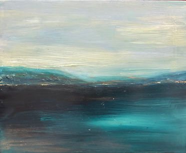 A tranquil seascape with soft light and rolling hills in the distance. Light dances along the shores showing life