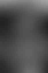 Black and white photo of mother and daughter hugging during family photoshoot in Williamsport PA