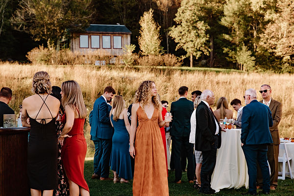 Cocktail hour during an intimate wedding in the fall in New England