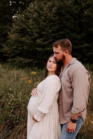 Couple at Rider Park during a fall maternity photoshoot in Williamsport, Pennsylvania