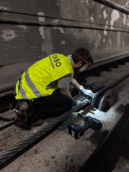 tokbo operator installing a bolt