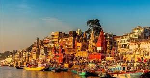 Why is it significant to conduct pooja for Moksha (liberation) of souls of one’s ancestors in Kashi?