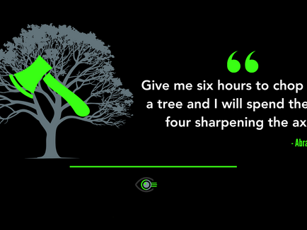 A digital graphic featuring a dark background with a grey silhouette of a large, leafless tree on the left. A bright green axe is embedded in the tree trunk, positioned diagonally. To the right of the tree, a quote is displayed in bold white text with green accents: “Give me six hours to chop down a tree and I will spend the first four sharpening the axe.” – Abraham Lincoln (author credit in green text). Below the quote is a thin green line with a small stylised eye logo incorporating green lines and a circular pupil beneath it.