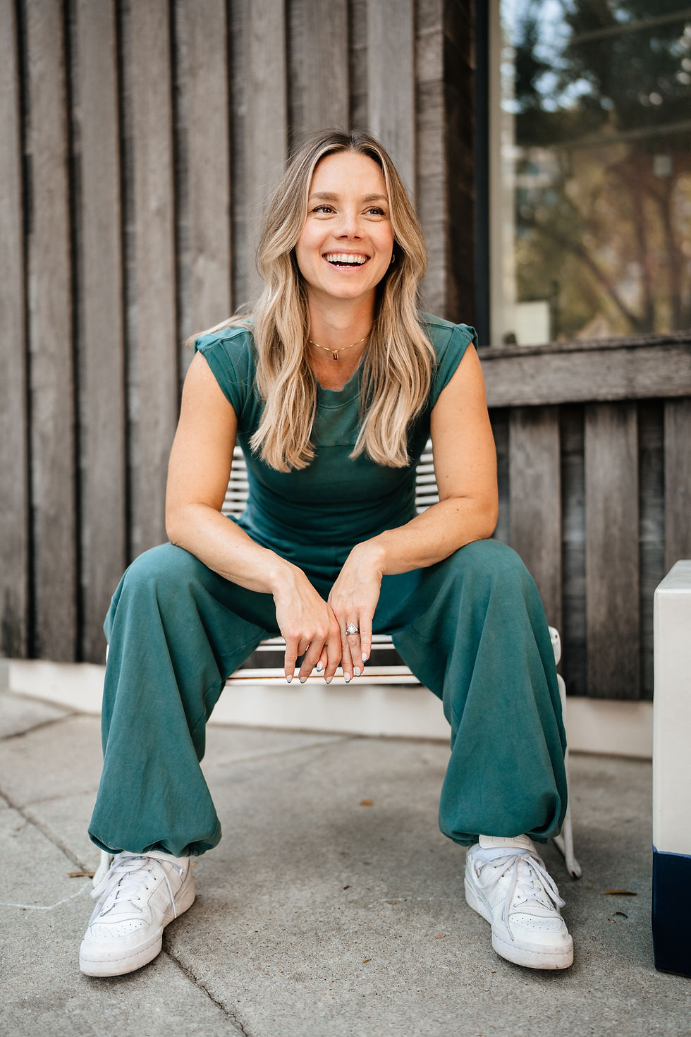 Photo of woman smiling sitting