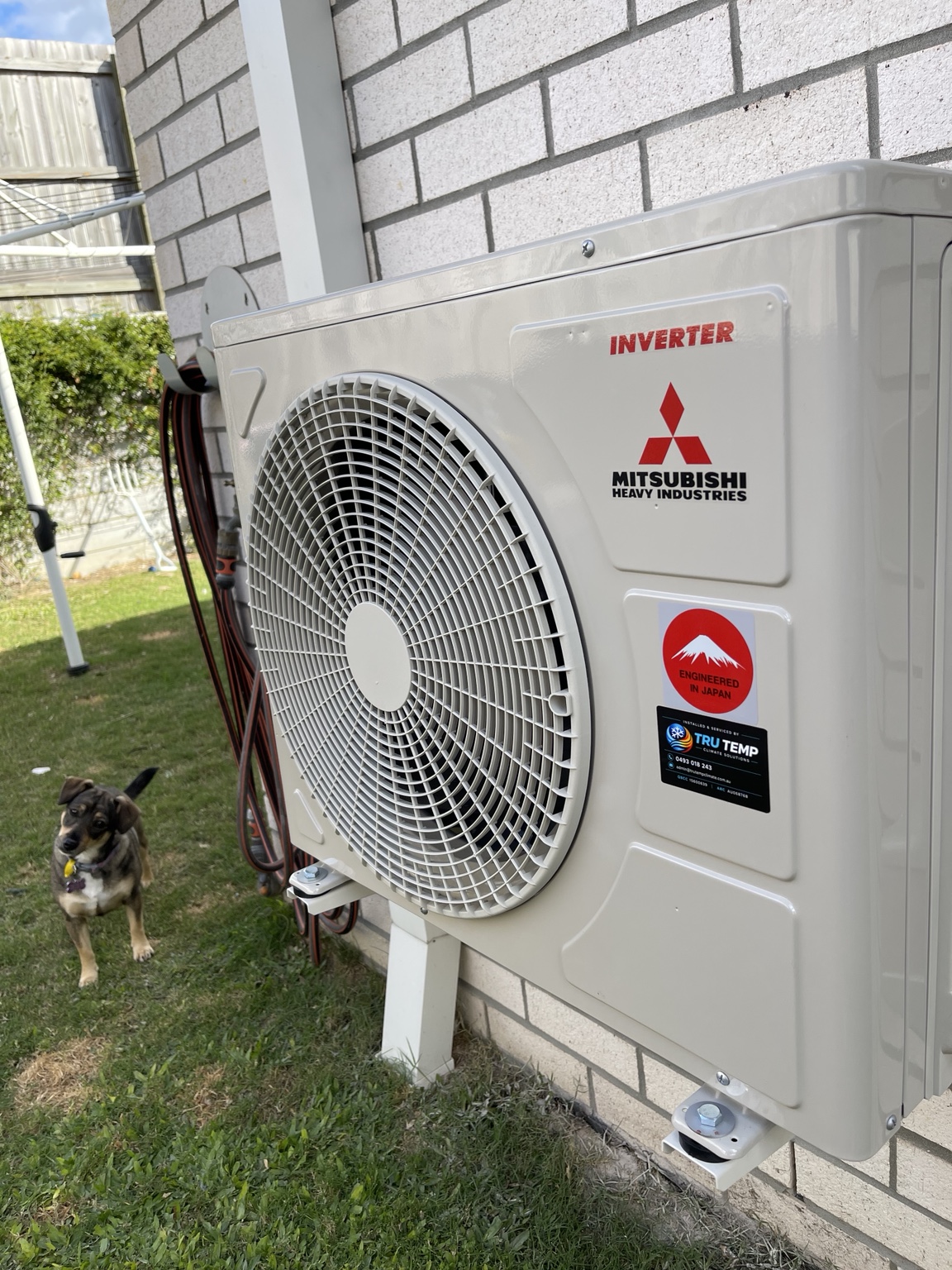 Close view of Mitsubishi Heavy Industries outdoor air conditioner