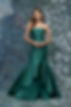 Mikado evening gown has a strapless sweetheart neckline with a delicate cuff and peek-a-boo beaded tulle detail on a fitted m