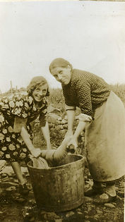 Aunty Peggy and Katie - washing day c1930.jpg