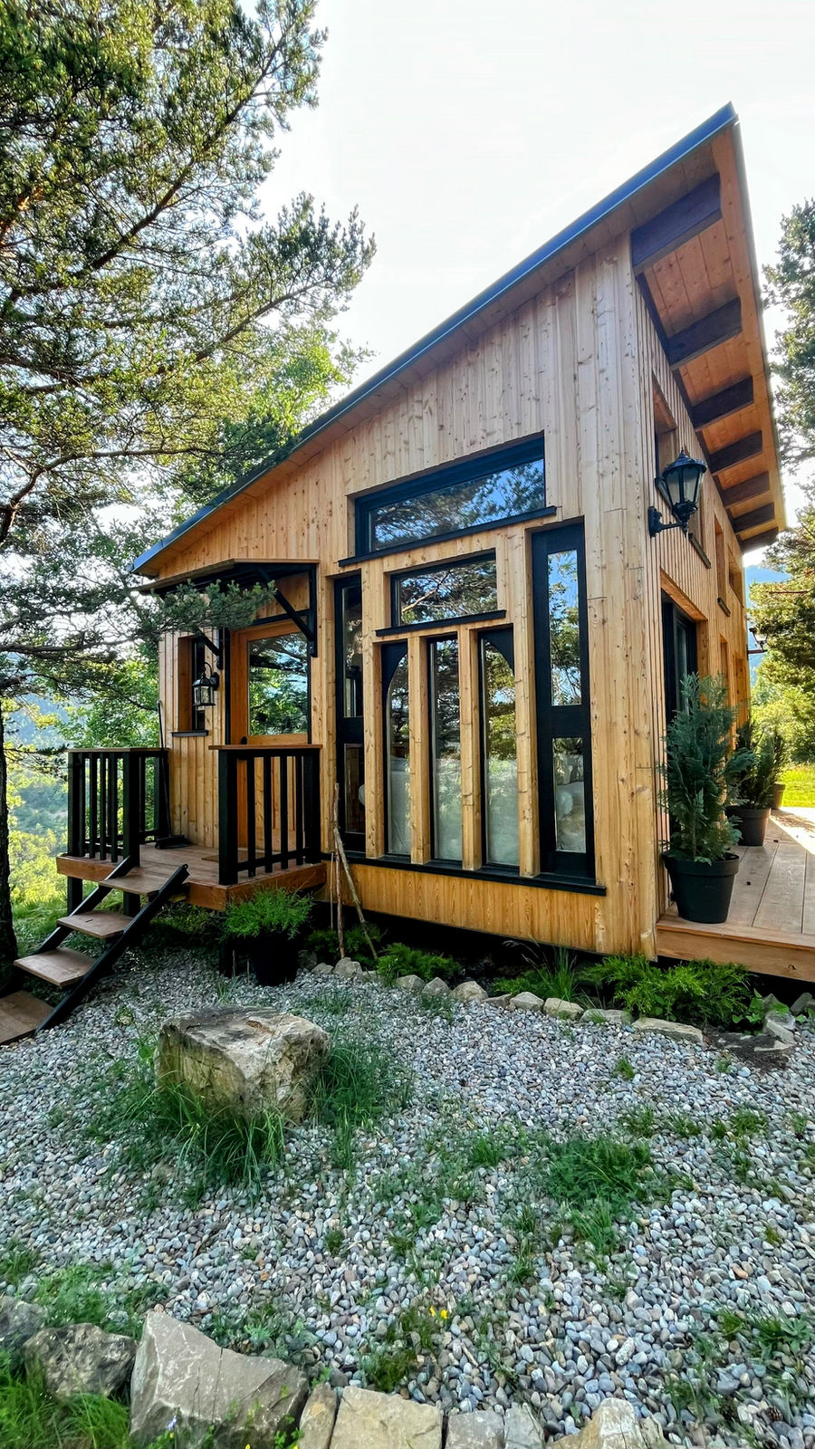 Located in the heart of the Pyrenees mountain range in northern Spain, Una Nevera Azul is a small, self-sufficient cabin designed and built by its owners. This bespoke micro-cabin, with a 29 m² (312 ft²) interior and a 12 m² (129 ft²) wood-decked terrace, serves as a retreat focused on slow living, environmental integration, and structural autonomy.
The design process began with a collection of reclaimed materials, including old glass panels, windows, and doors, which influenced the architectural layout and character of the cabin. The owners, a cabinetmaker and an interior designer, utilized these elements to create a home that reflects a resource-conscious approach to construction.
Una Nevera Azul operates independently from conventional energy sources, utilizing solar power and low-consumption systems. Heating is provided by a wood-burning stove, with gas used for cooking and hot water. The architectural design dissolves the boundary between the interior and the rugged mountain landscape, featuring expansive window apertures that capture panoramic views and maximize natural light.
The creators employed advanced digital and physical drafting techniques to optimize the cabin's orientation for solar heat gain and natural lighting. The interior layout maximizes verticality and volumetric efficiency, integrating a compact kitchen, sleeping zones, and living areas into a cohesive living space. The project took a total of 4 months to complete, involving two primary builders and additional assistance for a few days, encompassing both design and construction phases, resulting in the house as it stands today.
Project credits
Architects: D. John Wiehahn & L. O. Pereira
Photography: L. O. Pereira
Location: Pyrenees, Aragón, Spain