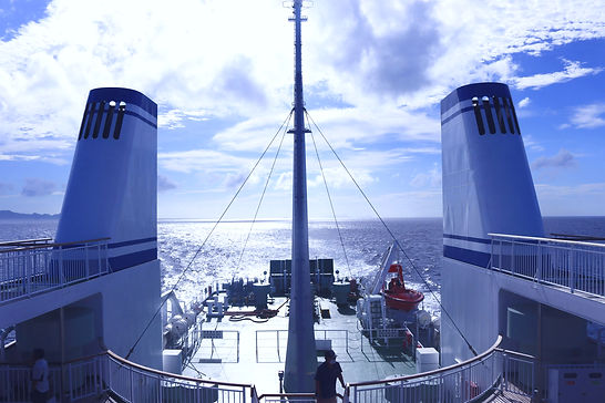 blue and white ship on sea during daytime_edited.jpg