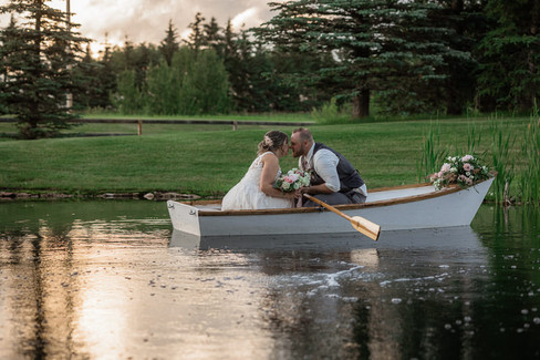 Bride and Groom kiss boat photos