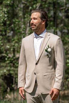 Groom waiting for the ceremony at a Bragg Creek Airbnb wedding venue