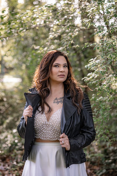 unique bridal photos with biker jacket