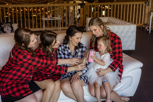 Bride and wedding party getting ready together 