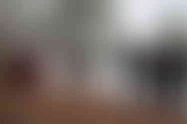 Bride and groom with bridal party during ceremony