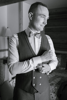 groom getting ready black and white photo