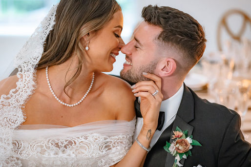 bridal couple about to kiss