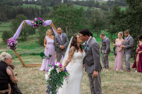 Bride and Groom kiss