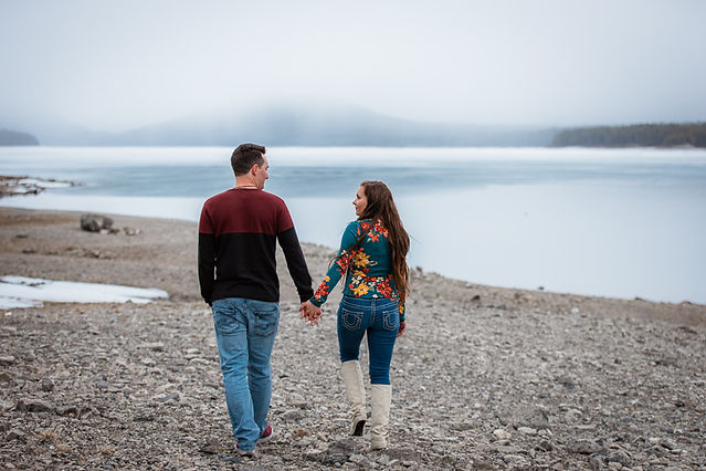 hand holding engagement photos 