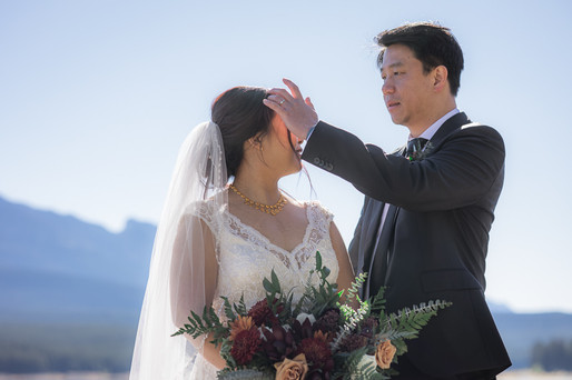 Groom fixes Bride hair