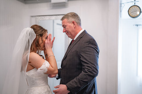 Bride sharing an emotional first look with her father before a Cork and Crate wedding