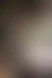 Groom helping bride off quad